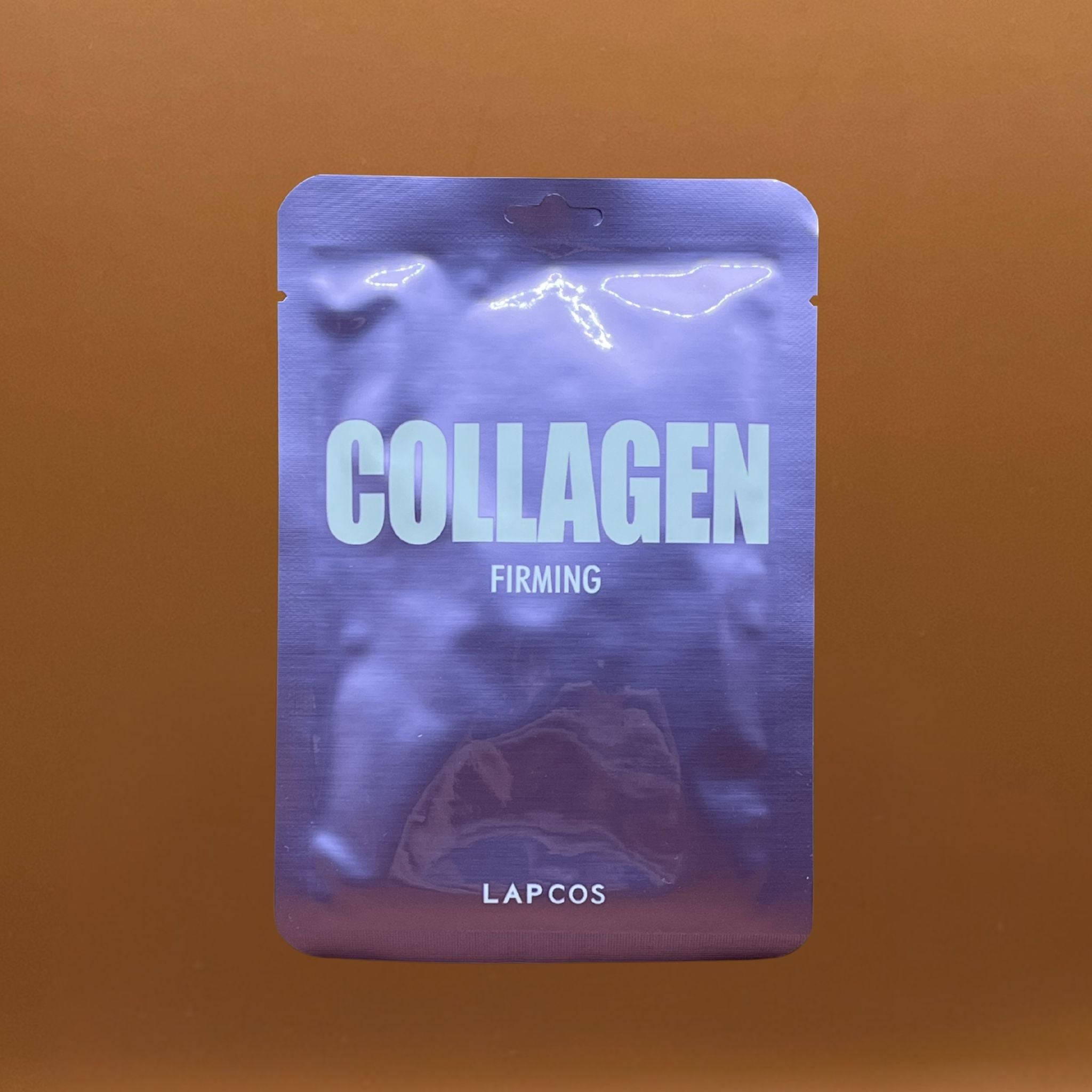 Collagen firming mask packaging with 'LAPCOS' branding on a brown background