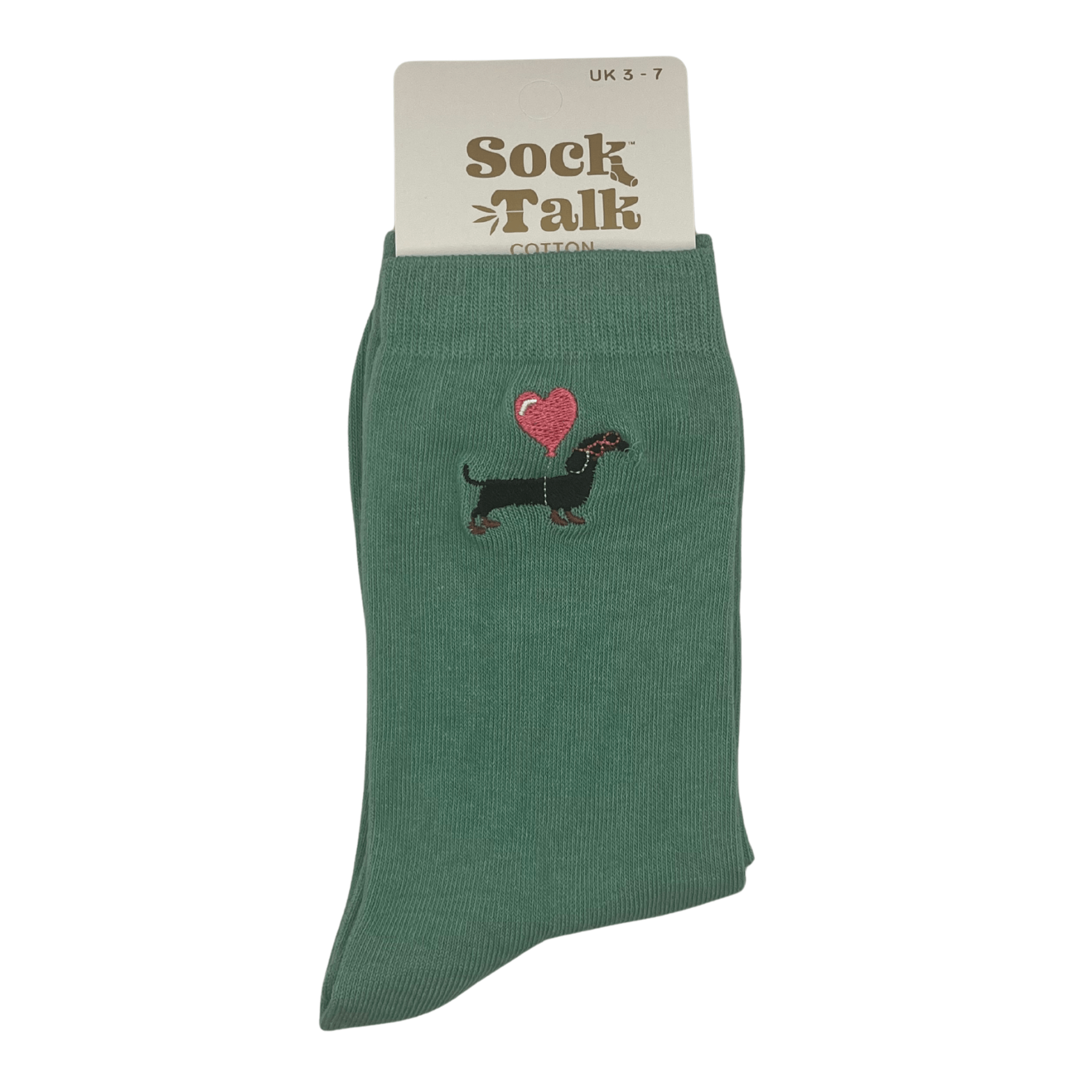 Green pair of womens socks with a dachshund with a heart baloon tied around it.