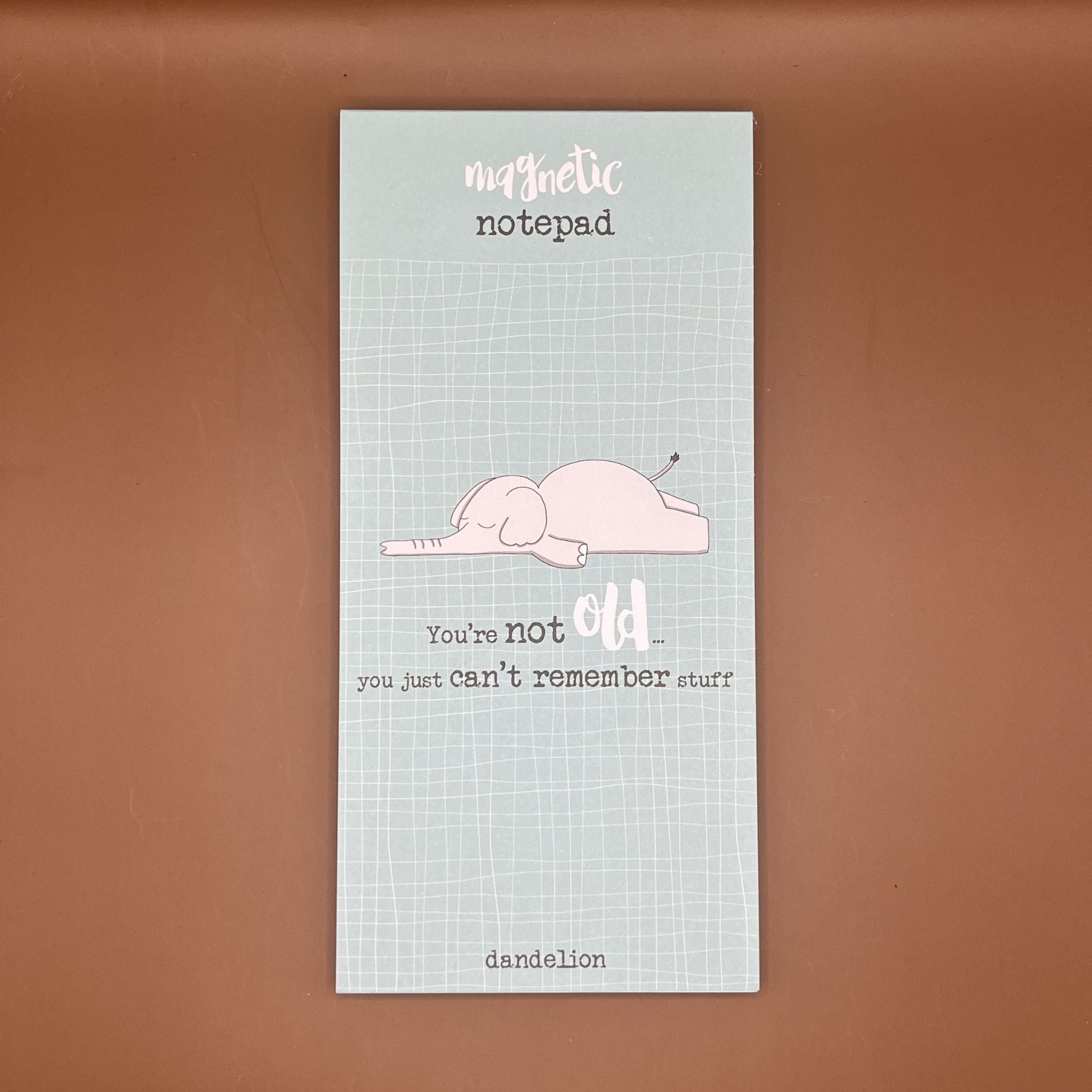 Notepad with an elephant illustration and humorous text