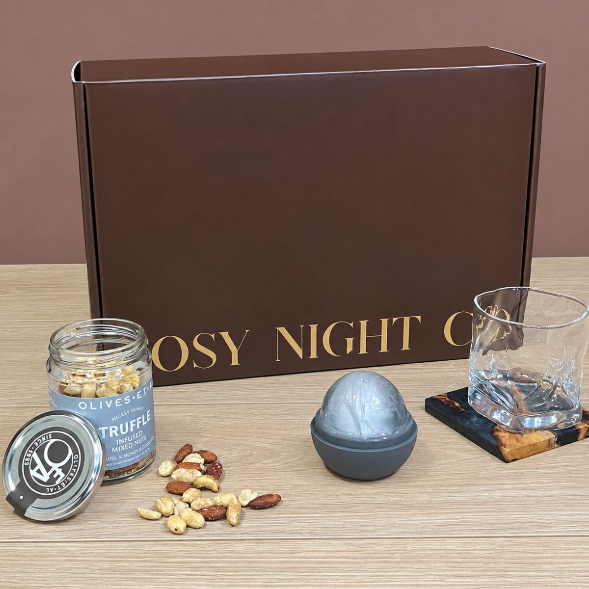 The Evening Ritual gift box with wave glass, wooden coaster, ice sphere mould and truffle-infused mixed nuts