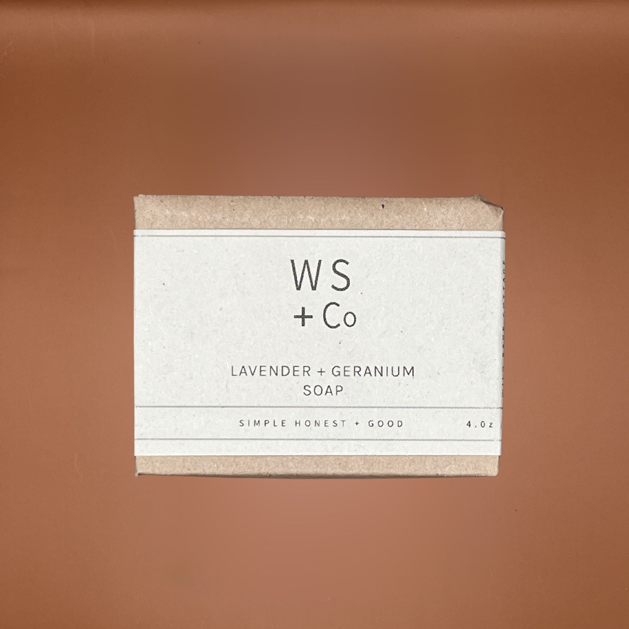 WS + Co lavender and geranium soap bar in brown paper packaging