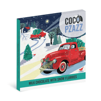 Chocolate in packaging with a red truck and snowy scene, featuring the brand 'Coco Pzazz'.