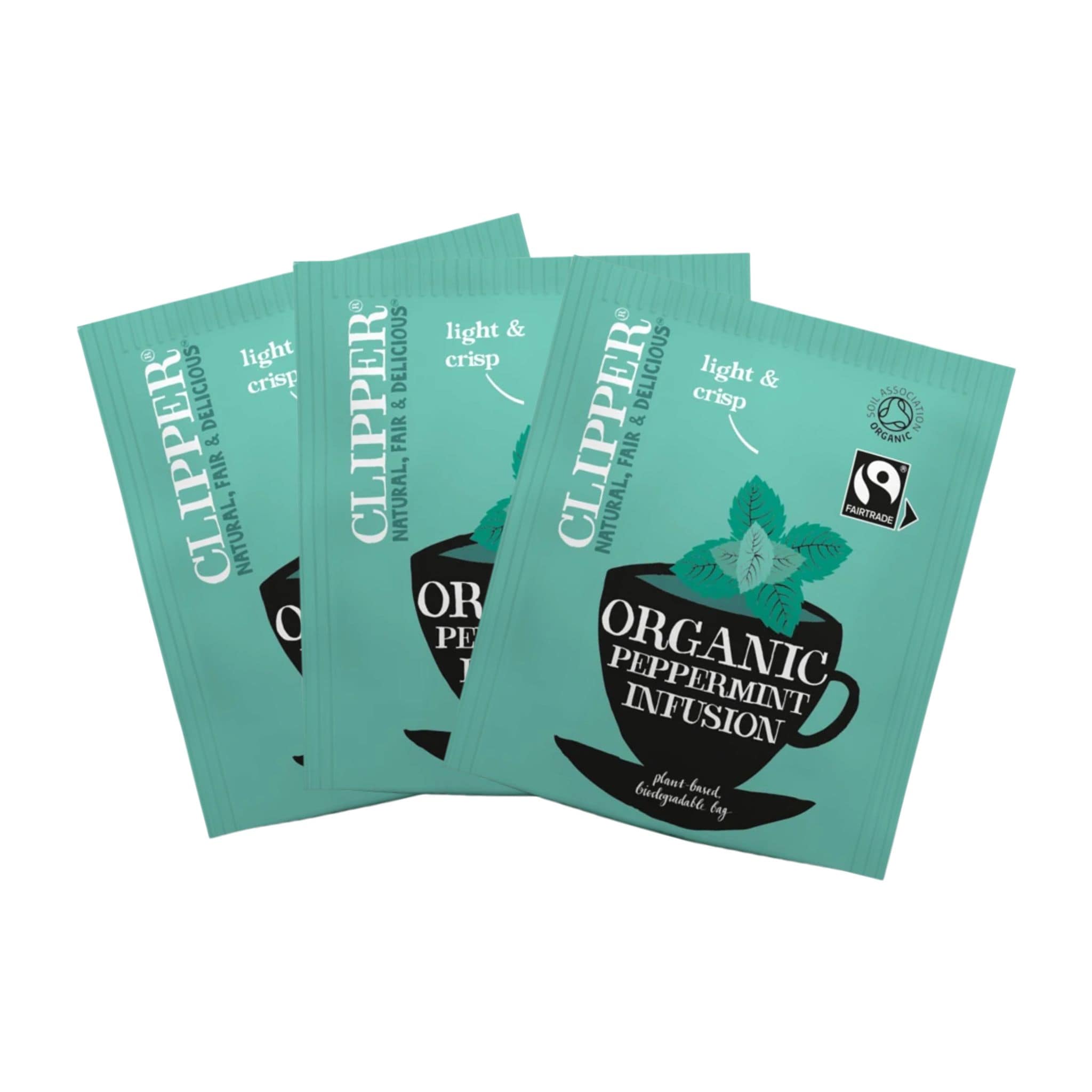 Three green Clipper tea bags for organic peppermint infusion.
