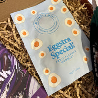 Bag of “Eggstra Special!” fruit flavour gummies from Ask Mummy & Daddy, decorated with fried egg sweet illustrations.