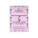 Bracelet with flamingo charm on a pink card with motivational text