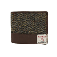 Wallet made from green and brown Harris Tweed fabric with brown leather trim and a Harris Tweed label on the front.