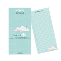 Pale blue notepad with a cute sleeping elephant illustration and text reading “You’re not old… you just can’t remember stuff.”