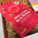 Close-up of You’re One In A Melon watermelon flavour gummies inside thank you letterbox gift box.