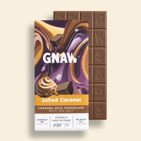 GNAW salted caramel chocolate bar with packaging on a beige background