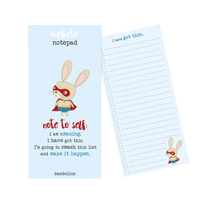Notepad with superhero rabbit design and motivational text on a white background