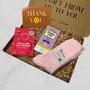 Thank you letterbox gift box with pink socks, chocolate bar, watermelon sweets and thank you card.