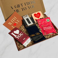 With love letterbox gift box with socks, chocolate bar, watermelon sweets and fun coaster.